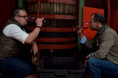 Luca and Elio Sadri in the winery tasting Barolo